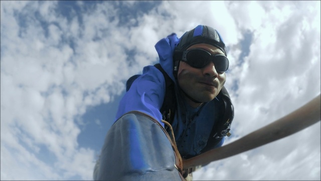 Video Reference N24: Cloud, Glasses, Sky, Outerwear, Goggles, Sunglasses, Vision care, Glove, Eyewear, Happy