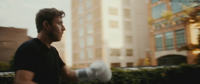Video Reference N7: Building, Flash photography, Plant, Window, Tower block, Grass, City, Elbow, White-collar worker, Sitting