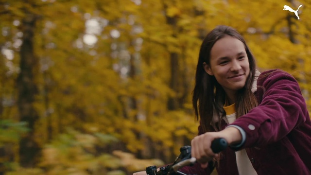 Video Reference N8: Face, Head, Smile, Bicycles--Equipment and supplies, Leaf, People in nature, Flash photography, Yellow, Bicycle handlebar, Sunlight