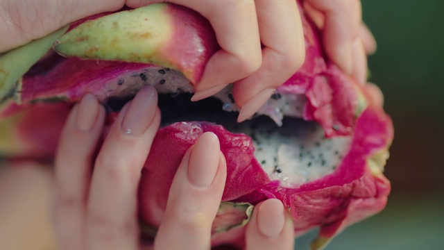 Video Reference N5: Hand, Finger, Pink, Gesture, Nail, Thumb, Petal, Terrestrial plant, Fruit, Magenta