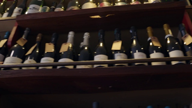 Video Reference N12: Bottle, Drinkware, Glass bottle, Alcoholic beverage, Wine cellar, Drink, Winery, Wine bottle, Art, Alcohol