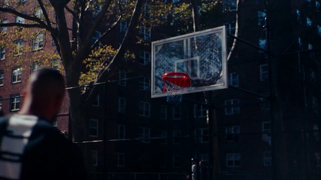 Video Reference N1: Daytime, Basketball, Basketball hoop, Tree, Building, Sports equipment, Wall, Streetball, City, Basketball court