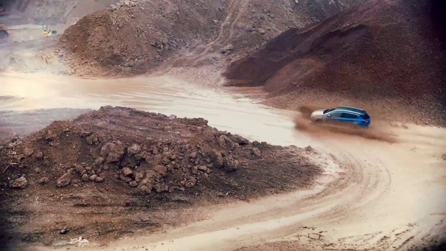 Video Reference N9: Automotive tire, Tire, Slope, Vehicle, Mountain, Terrain, Mountainous landforms, Off-road racing, Landscape, Formation