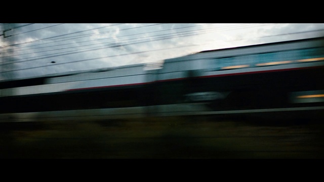 Video Reference N1: Cloud, Atmosphere, Train, Sky, Rectangle, Automotive lighting, Tints and shades, Font, Rolling stock, Railway