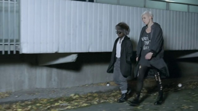 Video Reference N1: Grey, Asphalt, Street fashion, Road surface, Boot, Formal wear, Street, Sitting, Fun, Shadow