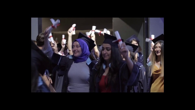 Video Reference N2: Smile, Mortarboard, Academic dress, Purple, Hat, Scholar, Graduation, Gesture, Headgear, Phd