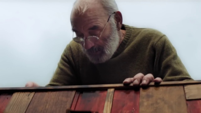 Video Reference N0: Head, Chin, Shirt, Mouth, Beard, Wood, Musical instrument, T-shirt, Facial hair, Wrinkle