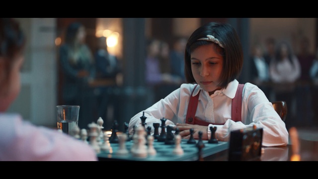 Video Reference N21: Table, Sports equipment, Eyelash, Player, Flash photography, Indoor games and sports, Championship, Competition event, Fun, Chess