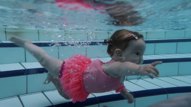 Video Reference N4: Water, Photograph, Swimming pool, Pink, Leisure, Toddler, Aqua, Red, Fun, One-piece swimsuit