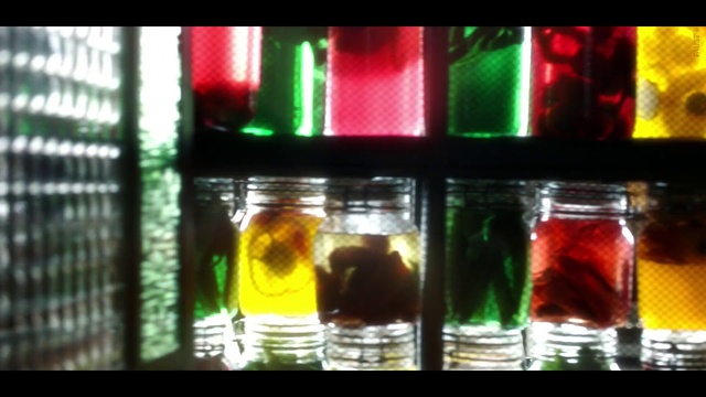 Video Reference N2: Drinkware, Liquid, Automotive lighting, Glass bottle, Fluid, Amber, Alcoholic beverage, Solution, Drink, Rectangle
