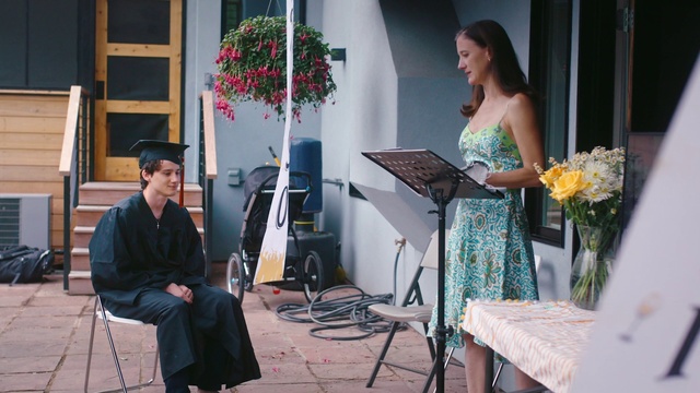 Video Reference N4: Clothing, Face, Furniture, Plant, Musician, Chair, Flower, Fashion, Dress, Music