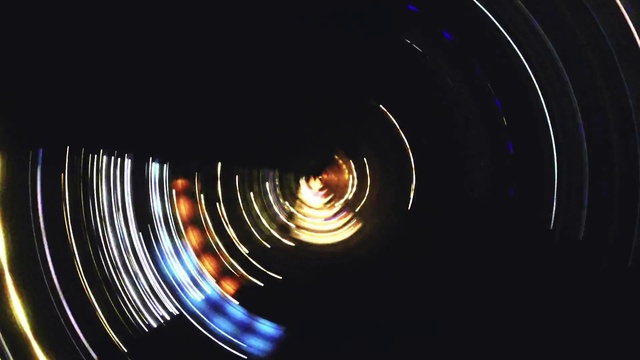 Video Reference N22: Amber, Circle, Electricity, Electric blue, Gas, Camera lens, Event, Darkness, Entertainment, Flash photography