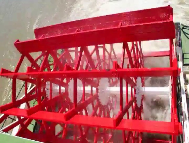 Video Reference N11: paddlewheel, Gas, Automotive wheel system, Engineering, Automotive exterior, Font, Crane, Auto part, Metal, Wood
