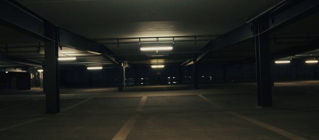 Video Reference N0: Electricity, Road surface, Asphalt, Parking, Tints and shades, Road, Symmetry, Fixture, City, Darkness