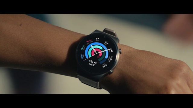Video Reference N1: Watch, Analog watch, Gesture, Clock, Watch accessory, Wrist, Font, Gadget, Electric blue, Flash photography