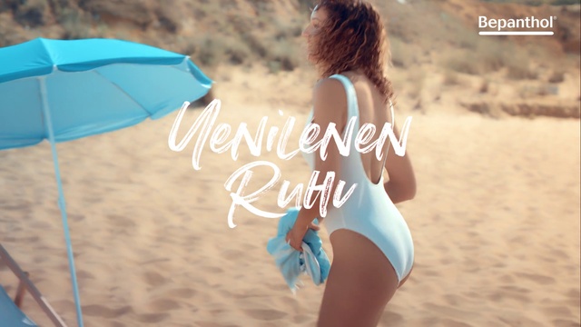 Video Reference N5: People on beach, Umbrella, Vertebrate, Swimsuit top, People in nature, Beach, Natural environment, Azure, Swimwear, Body of water