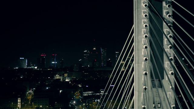 Video Reference N0: Building, Sky, Tower block, Skyscraper, Cityscape, Electricity, Cable-stayed bridge, Water, Bridge, Thoroughfare