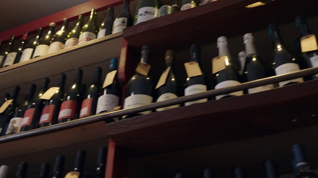 Video Reference N18: Furniture, Bottle, Shelf, Winery, Shelving, Wine cellar, Wine, Glass bottle, Alcoholic beverage, Drink