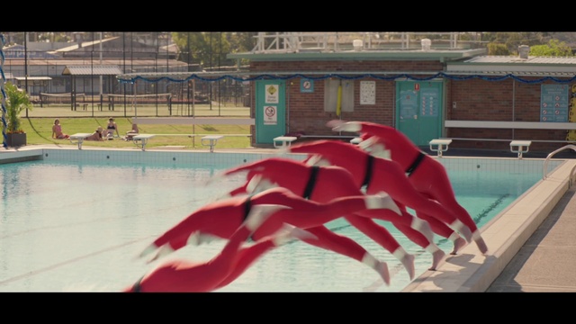 Video Reference N1: Water, Building, Window, Leisure, Art, Tints and shades, Fun, Font, Sport venue, Swimming pool