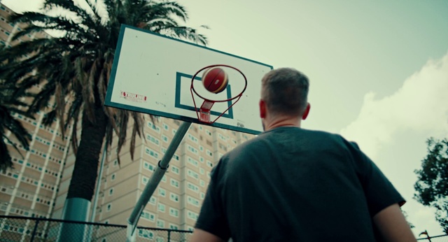 Video Reference N2: Basketball hoop, Sky, Sports equipment, Streetball, Tree, T-shirt, Ball, Font, Art, Leisure
