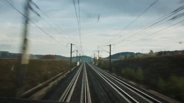 Video Reference N3: Cloud, Sky, Plant, Electricity, Tree, Vehicle, Overhead power line, Railway, Rolling, Track