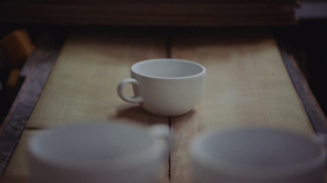 Video Reference N6: Tableware, Table, Coffee cup, Drinkware, Dishware, Cup, Teacup, Wood, Serveware, Porcelain