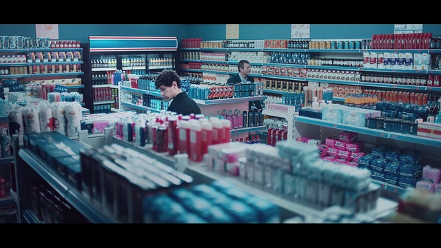 Video Reference N1: Shelf, Product, Bottle, Customer, Convenience store, Font, Retail, Display device, Drink, Technology