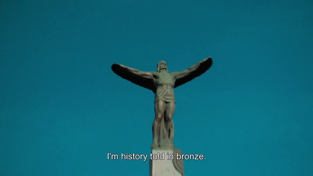 Video Reference N1: Sky, Human body, Sculpture, Statue, Cross, Gesture, Art, Religious item, Artifact, Monument