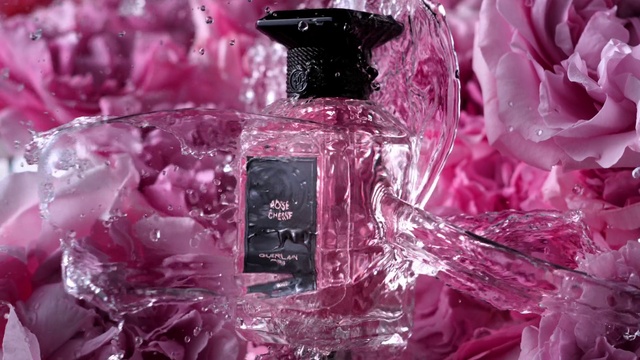 Video Reference N2: Liquid, Perfume, Purple, Drinkware, Fluid, Automotive lighting, Petal, Pink, Violet, Glass bottle