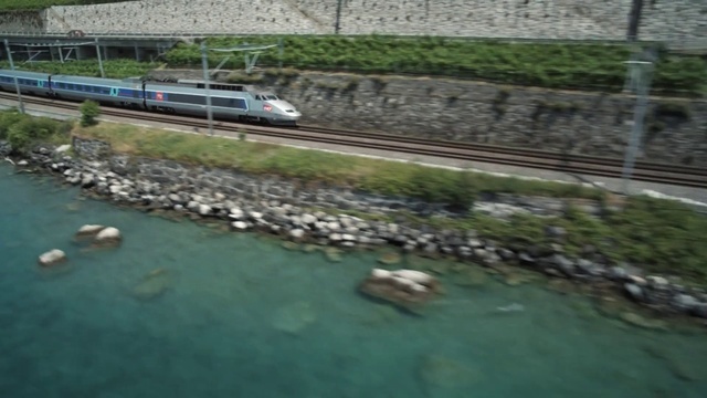 Video Reference N10: Water, Train, Vehicle, Plant, Rolling, Waterway, Urban design, Landscape, Railway, Grass