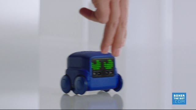 Video Reference N1: Toy, Gesture, Font, Wrist, Gadget, Electric blue, Electronic device, Plastic, Machine, Lego