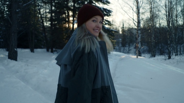 Video Reference N4: Smile, Plant, Overcoat, Tree, Flash photography, Snow, Street fashion, Sunlight, Dress, Freezing