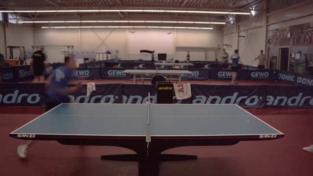 Video Reference N1: Table, Field house, Racketlon, Ping pong, Racquet sport, Racket, Chair, Table tennis racket, Hall, Line
