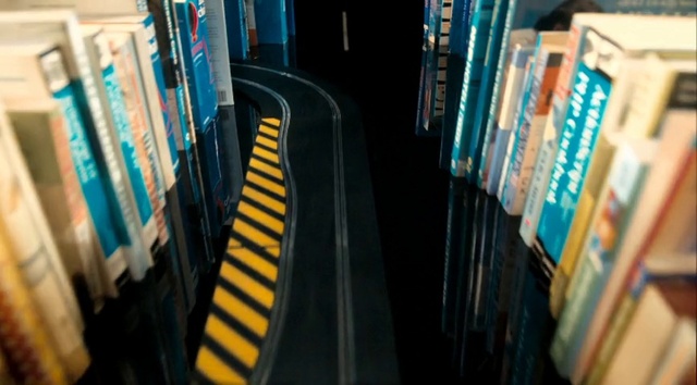 Video Reference N2: Publication, Parallel, Engineering, Shelving, Electronic device, Electric blue, City, Automotive tire, Building, Stairs