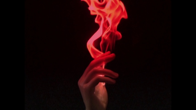 Video Reference N7: Human body, Petal, Magenta, Gas, Font, Smoke, Electric blue, Gesture, Darkness, Event