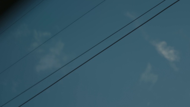 Video Reference N1: Cloud, Sky, Blue, Electricity, Overhead power line, Cable, Electrical supply, Wire, Electric blue, Calm