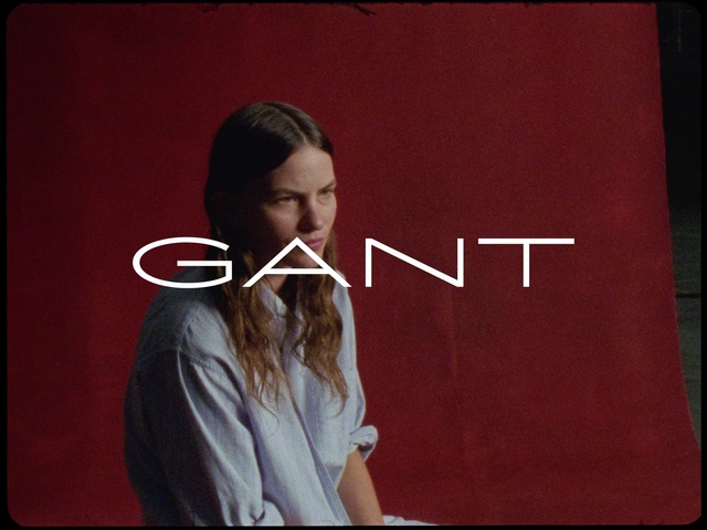 Video Reference N2: Sleeve, Eyelash, Gesture, Flash photography, Font, Magenta, Rectangle, Brand, Graphic design, Formal wear