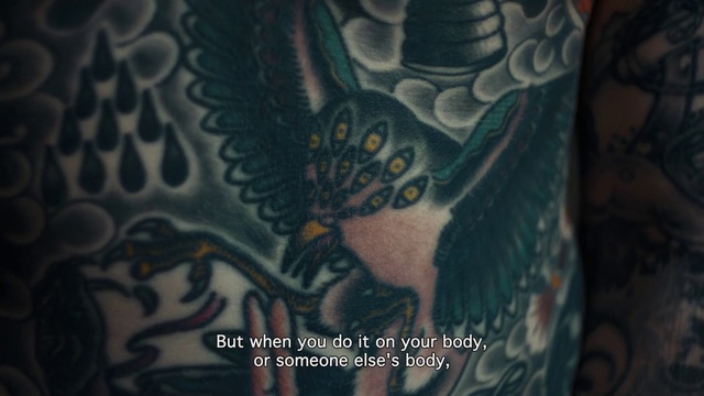 Video Reference N20: Azure, Human body, Neck, Sleeve, Temporary tattoo, Chest, Mythical creature, Wing, Trunk, Tattoo