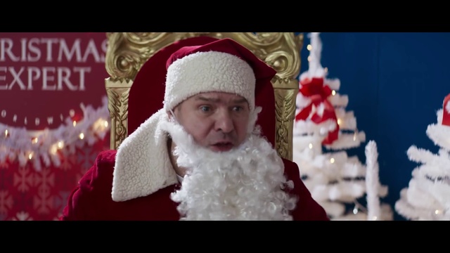 Video Reference N6: Face, Beard, Happy, Santa claus, Facial hair, Event, Cap, Holiday, Magenta, Christmas decoration