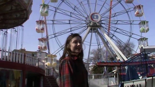 Video Reference N2: Sky, Wheel, Ferris wheel, Tartan, Leisure, Public space, Recreation, Travel, People, Plaid