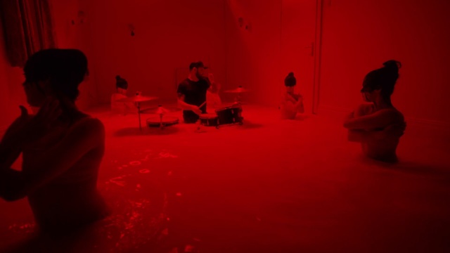 Video Reference N2: Black, Human body, Entertainment, Pink, Flooring, Chair, Magenta, Fun, Tints and shades, Performance art