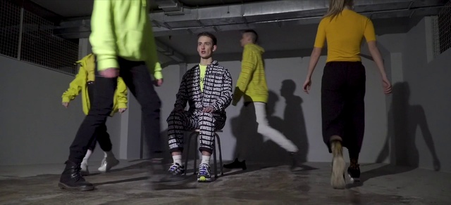 Video Reference N6: Joint, Shoe, Human, Fashion, Standing, Yellow, Performing arts, Entertainment, Social group, Fun
