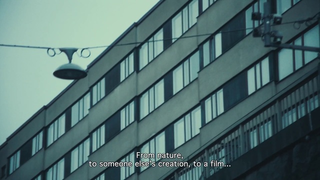 Video Reference N3: Daytime, Window, Building, Tower block, Condominium, Urban design, Street light, Font, Sky, City